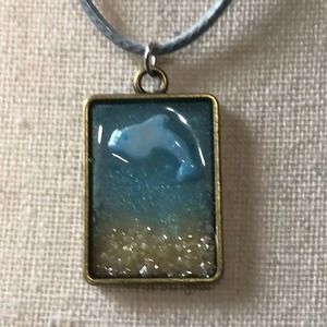 Handcrafted ocean scene dolphins pendant necklace